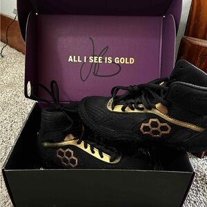 RUDIS Black and Gold Athletic Shoes